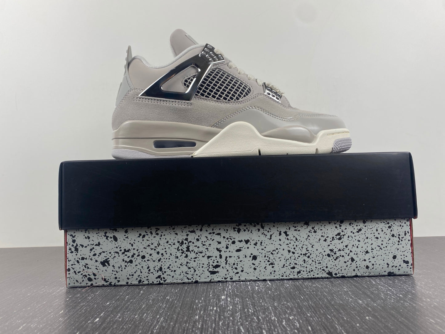 Jordan 4 Frozen Moment